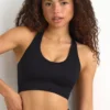 Reggiseno sportivo FlexiRib con dorso a vogatore in nero Reggiseno sportivo FlexiRib con dorso a vogatore in nero