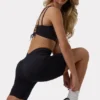 Reggiseno sportivo FlexiRib con scollo rotondo e allacciatura sul retro, colore nero Reggiseno sportivo FlexiRib con scollo rotondo e allacciatura sul retro, colore nero