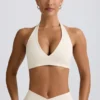 Reggiseno sportivo in jersey spazzolato con scollo a V in avorio melange Reggiseno sportivo in jersey spazzolato con scollo a V in avorio melange