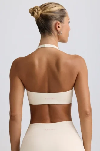 Reggiseno sportivo in jersey spazzolato con scollo a V in avorio melange