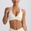 Reggiseno sportivo in jersey spazzolato con scollo a V in avorio melange Reggiseno sportivo in jersey spazzolato con scollo a V in avorio melange