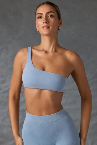 Reggiseno sportivo monospalla in blu slavato