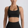 Reggiseno sportivo senza cuciture con dorso a T Super Sculpt in nero Reggiseno sportivo senza cuciture con dorso a T Super Sculpt in nero
