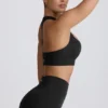 Reggiseno sportivo senza cuciture con dorso a T Super Sculpt in nero Reggiseno sportivo senza cuciture con dorso a T Super Sculpt in nero