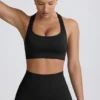 Reggiseno sportivo senza cuciture con dorso a T Super Sculpt in nero Reggiseno sportivo senza cuciture con dorso a T Super Sculpt in nero