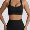 Reggiseno sportivo senza cuciture con dorso a T Super Sculpt in nero Reggiseno sportivo senza cuciture con dorso a T Super Sculpt in nero