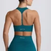 Reggiseno sportivo senza cuciture con dorso a T Super Sculpt in verde acqua Reggiseno sportivo senza cuciture con dorso a T Super Sculpt in verde acqua