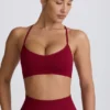 Reggiseno sportivo senza cuciture con incrocio sulla schiena Super Sculpt in bordeaux Reggiseno sportivo senza cuciture con incrocio sulla schiena Super Sculpt in bordeaux