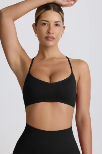 Reggiseno sportivo senza cuciture con spalline incrociate Super Sculpt in nero