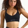 Reggiseno sportivo senza cuciture con spalline incrociate Super Sculpt in nero Reggiseno sportivo senza cuciture con spalline incrociate Super Sculpt in nero