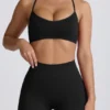 Reggiseno sportivo senza cuciture con spalline incrociate Super Sculpt in nero Reggiseno sportivo senza cuciture con spalline incrociate Super Sculpt in nero
