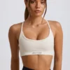 Reggiseno sportivo senza cuciture e senza schienale Super Sculpt in bianco Reggiseno sportivo senza cuciture e senza schienale Super Sculpt in bianco