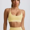 Reggiseno sportivo senza cuciture e senza schienale Super Sculpt in giallo burro Reggiseno sportivo senza cuciture e senza schienale Super Sculpt in giallo burro