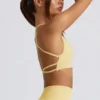 Reggiseno sportivo senza cuciture e senza schienale Super Sculpt in giallo burro Reggiseno sportivo senza cuciture e senza schienale Super Sculpt in giallo burro