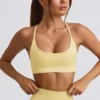 Reggiseno sportivo senza cuciture e senza schienale Super Sculpt in giallo burro Reggiseno sportivo senza cuciture e senza schienale Super Sculpt in giallo burro