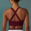 Reggiseno sportivo senza cuciture Super Sculpt con incrocio sulla schiena in color prugna Reggiseno sportivo senza cuciture Super Sculpt con incrocio sulla schiena in color prugna