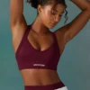 Reggiseno sportivo senza cuciture Super Sculpt con incrocio sulla schiena in color prugna Reggiseno sportivo senza cuciture Super Sculpt con incrocio sulla schiena in color prugna