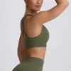 Reggiseno sportivo senza cuciture Super Sculpt con incrocio sulla schiena in verde chiaro Reggiseno sportivo senza cuciture Super Sculpt con incrocio sulla schiena in verde chiaro