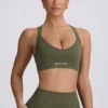 Reggiseno sportivo senza cuciture Super Sculpt con incrocio sulla schiena in verde chiaro Reggiseno sportivo senza cuciture Super Sculpt con incrocio sulla schiena in verde chiaro