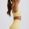 Reggiseno sportivo senza cuciture Super Sculpt con spalline incrociate in giallo burro Reggiseno sportivo senza cuciture Super Sculpt con spalline incrociate in giallo burro