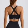 Reggiseno sportivo senza cuciture Super Sculpt con spalline incrociate in nero Reggiseno sportivo senza cuciture Super Sculpt con spalline incrociate in nero