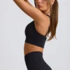 Reggiseno sportivo senza cuciture Super Sculpt con spalline incrociate in nero Reggiseno sportivo senza cuciture Super Sculpt con spalline incrociate in nero