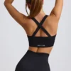 Reggiseno sportivo senza cuciture Super Sculpt con spalline incrociate in nero Reggiseno sportivo senza cuciture Super Sculpt con spalline incrociate in nero