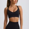 Reggiseno sportivo senza cuciture Super Sculpt con spalline incrociate in nero Reggiseno sportivo senza cuciture Super Sculpt con spalline incrociate in nero