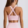 Reggiseno sportivo senza cuciture Super Sculpt con spalline incrociate in rosa cipria Reggiseno sportivo senza cuciture Super Sculpt con spalline incrociate in rosa cipria