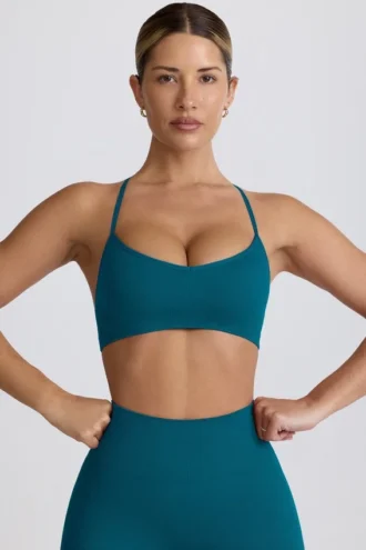 Reggiseno sportivo senza cuciture Super Sculpt con spalline incrociate sul retro in verde acqua Reggiseno sportivo senza cuciture Super Sculpt con spalline incrociate sul retro in verde acqua