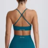 Reggiseno sportivo senza cuciture Super Sculpt con spalline incrociate sul retro in verde acqua Reggiseno sportivo senza cuciture Super Sculpt con spalline incrociate sul retro in verde acqua