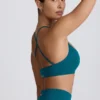 Reggiseno sportivo senza cuciture Super Sculpt con spalline incrociate sul retro in verde acqua Reggiseno sportivo senza cuciture Super Sculpt con spalline incrociate sul retro in verde acqua