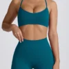 Reggiseno sportivo senza cuciture Super Sculpt con spalline incrociate sul retro in verde acqua Reggiseno sportivo senza cuciture Super Sculpt con spalline incrociate sul retro in verde acqua