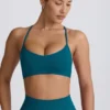 Reggiseno sportivo senza cuciture Super Sculpt con spalline incrociate sul retro in verde acqua Reggiseno sportivo senza cuciture Super Sculpt con spalline incrociate sul retro in verde acqua