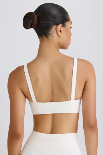 Reggiseno sportivo Soft Active con bordi a contrasto in bianco Reggiseno sportivo Soft Active con bordi a contrasto in bianco