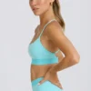 Reggiseno sportivo Soft Active con incrocio sulla schiena in acquamarina Reggiseno sportivo Soft Active con incrocio sulla schiena in acquamarina