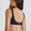 Reggiseno sportivo Soft Active con parte anteriore intrecciata in nero Reggiseno sportivo Soft Active con parte anteriore intrecciata in nero