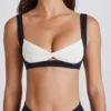 Reggiseno sportivo Soft Active con parte anteriore intrecciata in nero Reggiseno sportivo Soft Active con parte anteriore intrecciata in nero