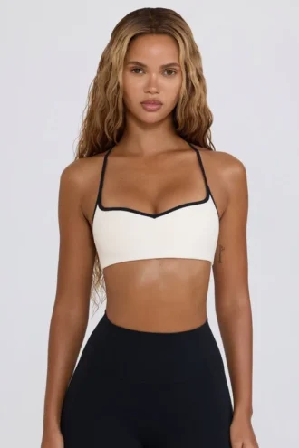 Reggiseno sportivo Soft Active con scollo a cuore in bianco