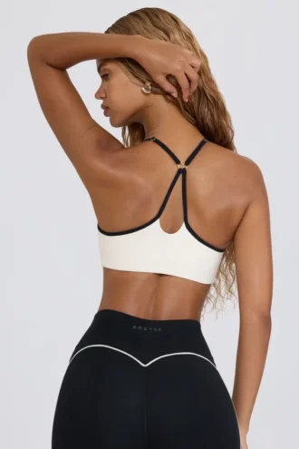 Reggiseno sportivo Soft Active con scollo a cuore in bianco