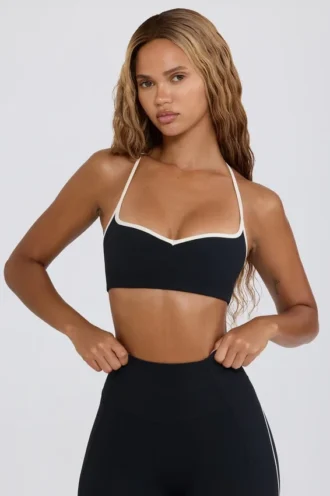 Reggiseno sportivo Soft Active con scollo a cuore in nero