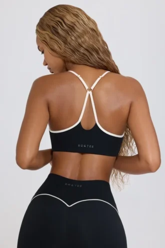 Reggiseno sportivo Soft Active con scollo a cuore in nero