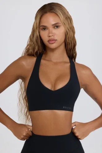 Reggiseno sportivo Soft Active con scollo a V in nero