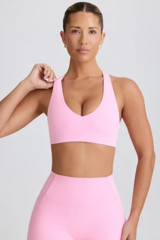 Reggiseno sportivo Soft Active con scollo a V in rosa baby