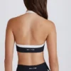 Reggiseno sportivo Soft Active con scollo all’americana e parte anteriore intrecciata in nero