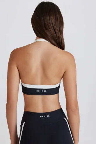 Reggiseno sportivo Soft Active con scollo all’americana e parte anteriore intrecciata in nero