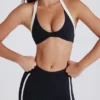 Reggiseno sportivo Soft Active con scollo all’americana e parte anteriore intrecciata in nero