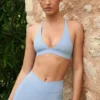 Reggiseno sportivo Soft Active con spalline incrociate in azzurro