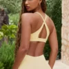 Reggiseno sportivo Soft Active con spalline incrociate in colore Lemon