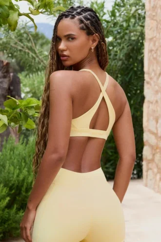 Reggiseno sportivo Soft Active con spalline incrociate in colore Lemon